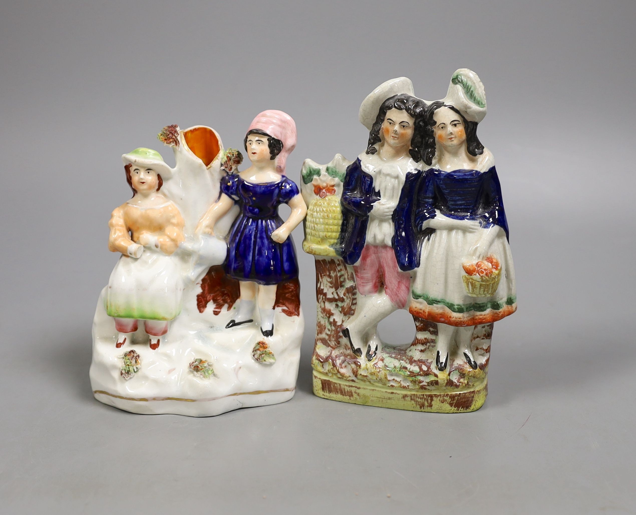 Two small Staffordshire figure groups, tallest 16 cms high.